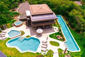 Naumi N551 | High Floor Condo in Playas del Coco + Pools & Beach Club