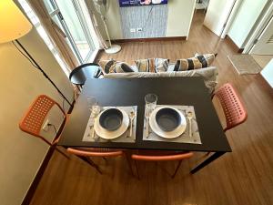 Chic 1BR Condo With Mid-Century Charm & Balcony View