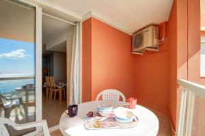Au Cayenne – Appartement cosy, terrasse vue mer, tout équipé, plages à pied