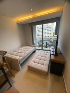 Comfortable 1 BR apt steps from Shopping del Sol