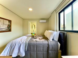 Apto a 450m PRAIA 10 min do BETO CARREIRO 2 Quartos Cozinha completa Churrasqueira Ar Condicionado Wi-Fi e vaga privativa de garagem Reserve agora mesmo