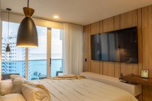 Apto con Vista al Mar, Piscinas, jacuzzis y club de playa en Reserva del Mar