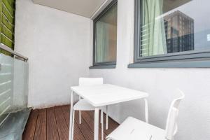 Central Modern 2BR Flat with Parking & Balcony