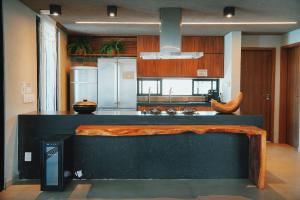 Casa Waua | PÉ NA AREIA, rooftop, borda infinita