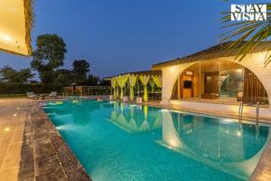 StayVista at Risacca - Amer Luxury cottages