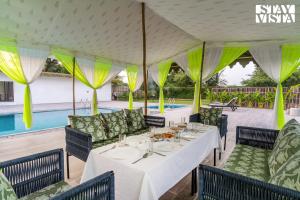 StayVista at Risacca - Amer Luxury cottages