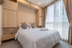 Olympus city garden direct pool access apartment by Sankalp