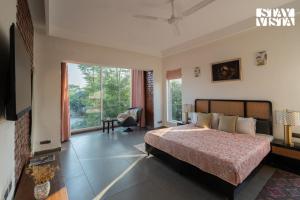 StayVista at Villa Aera with Pool, Lawn
