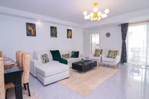 newly furnished two bedroom apartment with swimming pool, fully equipped gym, private parking space ,children playground and unbeatable scenic city views