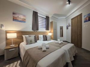 Modern 1BD Ground Floor Apartment at The Podium - Yacht Marina Area, Close to Valletta