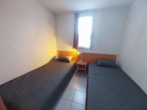 Pavillon T3 climatisé, piscine et parking