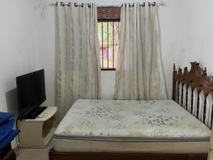 Casa de Paula , pé na areia Bertioga 777