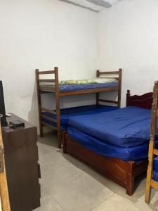 Casa de Paula , pé na areia Bertioga 777