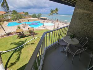 Marupiara Suites - Apartamento frente mar até 5 pessoas - Muro Alto