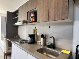 Suite Moderna con Piscina cerca al Mar