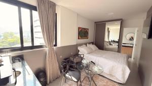 Studio, piscina, sinuca, academia sauna a 3 min praia