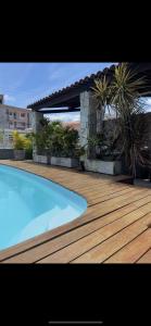 Casa na Praia de Camboinha, com 4 quartos, 4 banheiros , 2 salas amplas , terraço amplo em L , espaço para 10 redes, piscina , churrasqueira , a 100 metros do mar de cabedelo João Pessoa #Camboinha #aluguel #verao #mar #ferias