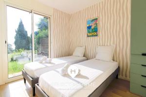 SELECTsoHOME - Vue mer et jardin privé - AURA