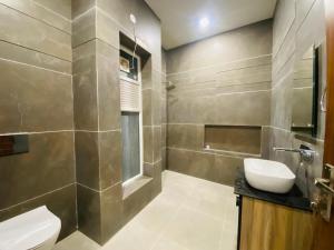 A peaceful 2bhk farmhouse with open space for parties