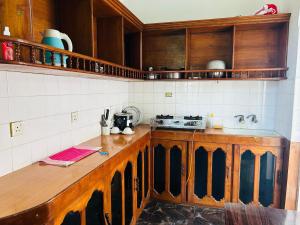 Sarojeni Apartments and Rooms