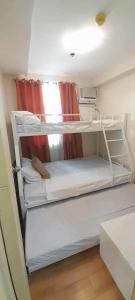 Cozy 2BR Seabreeze Suites Stunning Pool View, Near the Airport & Samal Island