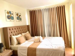 Cozy 2BR Seabreeze Suites Stunning Pool View, Near the Airport & Samal Island