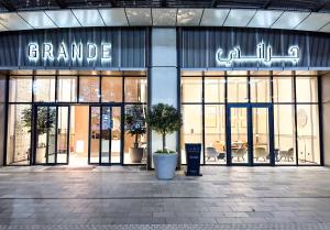 GRANDE SIGNATURE with a direct Burj Khalifa view and Private Fountain Show at 62nd floor with DXB AIRPORT VIP Shuttle option for 6 guests