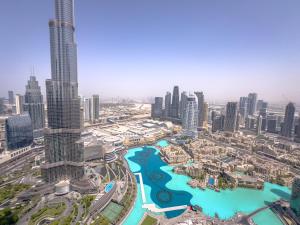 GRANDE SIGNATURE with a direct Burj Khalifa view and Private Fountain Show at 62nd floor with DXB AIRPORT VIP Shuttle option for 6 guests