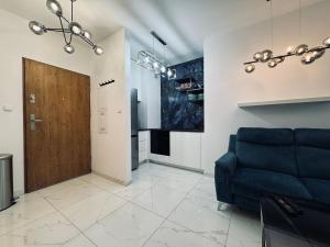 Apartament Kolorowe Garbary 22B z prywatnym miejscem postojowym