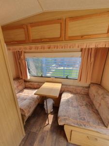 relax and enjoy in this cozy caravan