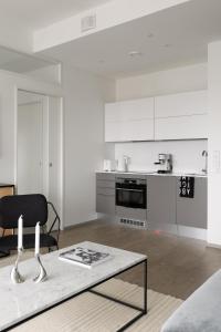 Scandinavian Minimalist Seaside Flat on Top Metro with downtown view