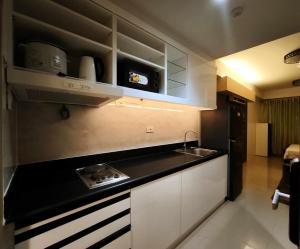 Sithonia Suite, Shore Residences Tower C near MOA