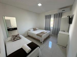 Hospedagem Casa Branca Localizada em um bairro nobre de Capitólio, Escarpas do Lago