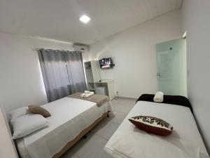 Hospedagem Casa Branca Localizada em um bairro nobre de Capitólio, Escarpas do Lago