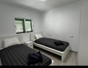 Beach life only 5 minutes away and Heated pool