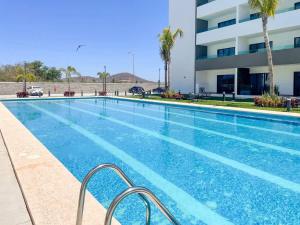 Cozy apartment with pools near the beach