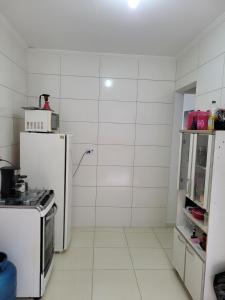 Casa confortável 3 min praia com wifi, churrasqueira e rede de descanso