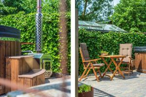 Gastsuite het Duinroosje met hottub op het privé terras!