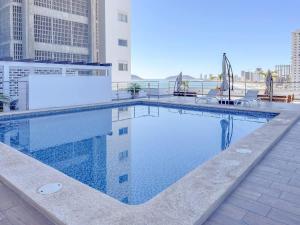 Apartment for 8 behind el malecon with a pool