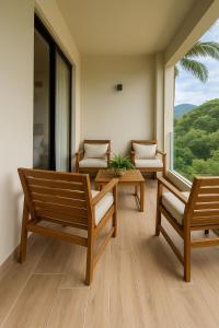 Marien Residences 221 Garden & Partial Ocean View Condo