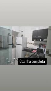 Casa praia de condomínio com piscina e churrasqueira