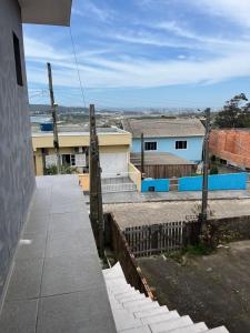 Casa com vista para o mar e perto do centro