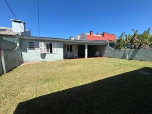 Casa Xangri-Lá no centro divisa com Atlântida