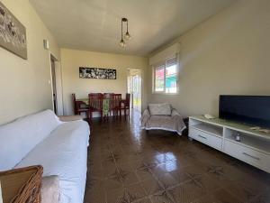 Casa Xangri-Lá no centro divisa com Atlântida