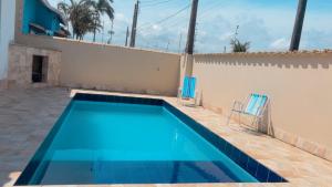 Casa temporada com piscina 600 metros da praia
