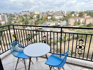 modern serenity suites apartments with swimming pool,modern equipped gym,private parking space, children playing ground, proximity to major shopping malls and unbeatable city views