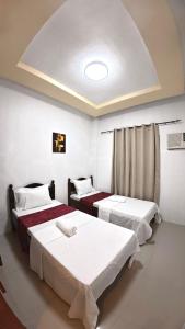 Cozy Stop Inn - Puerto Princesa