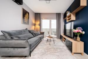 Manufaktura Apt - 9th Floor, Parking, AC - by Rentujemy