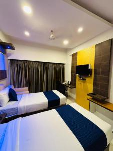 Hotel Sandalwood Inn - Rooms and Spa
