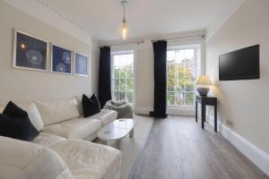 Elegant Period Town Centre Apartment with Parking